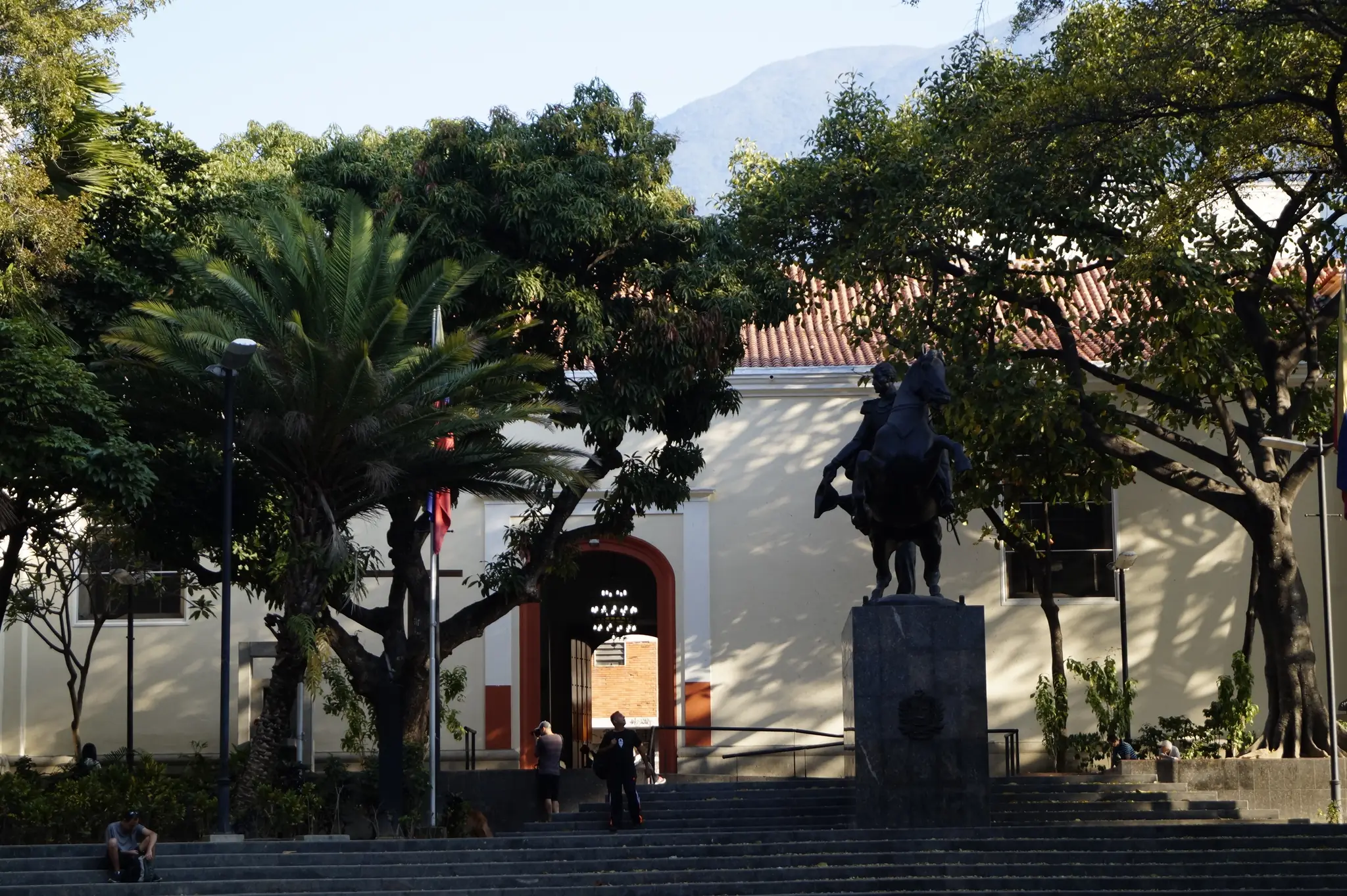 Plaza Bolívar in Chacao: the equestrian statue of Bolívar in front of the church, with El Ávila behind